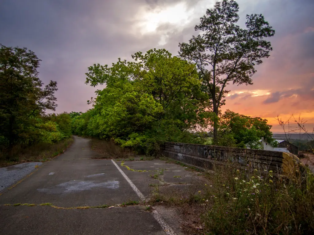 abandoned turnpike during sunset