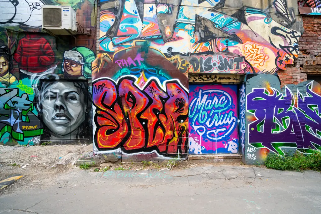 walls full of graffiti in toronto graffiti alley